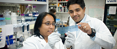 Two pharmacists in lab